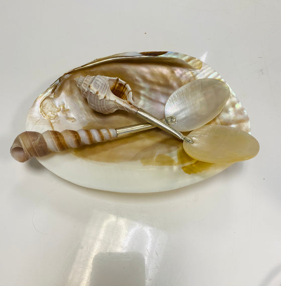 Clam Dish With Serving Spoons